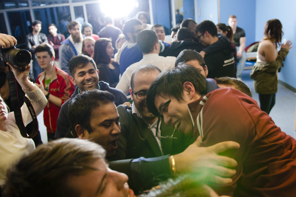 Members of the crowd lifted president-elect Enoch Weng above their heads moments after his win was announced. - Brandon Hillier